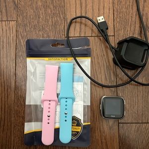 Fitbit Versa. Comes with 2 bands.